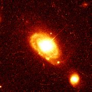 ������ PG 0052-251, ����������� �� ���������� 1,4 ����. �������� ���.